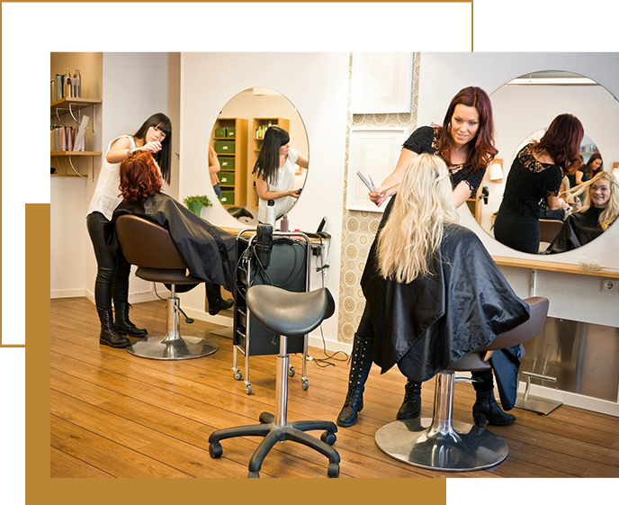 A woman is cutting her hair in the salon.