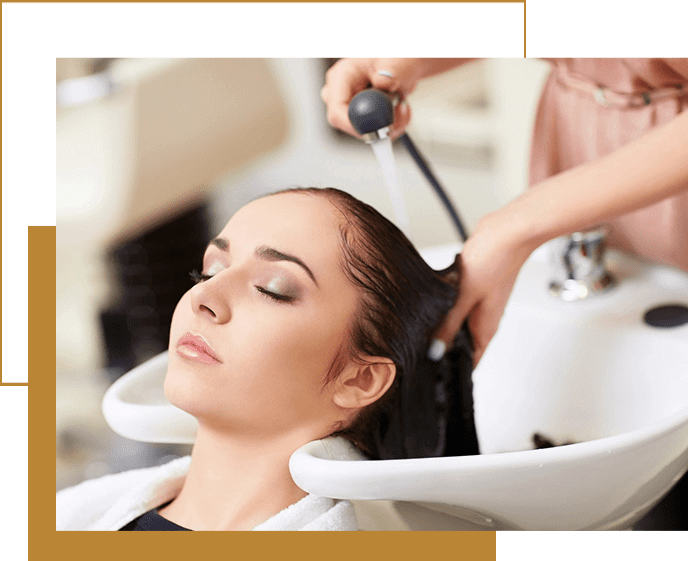 A woman getting her hair cut at the salon